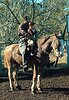 Uruguay, Salto-Region, Rancher mit seinem Sohn zu Pferd
